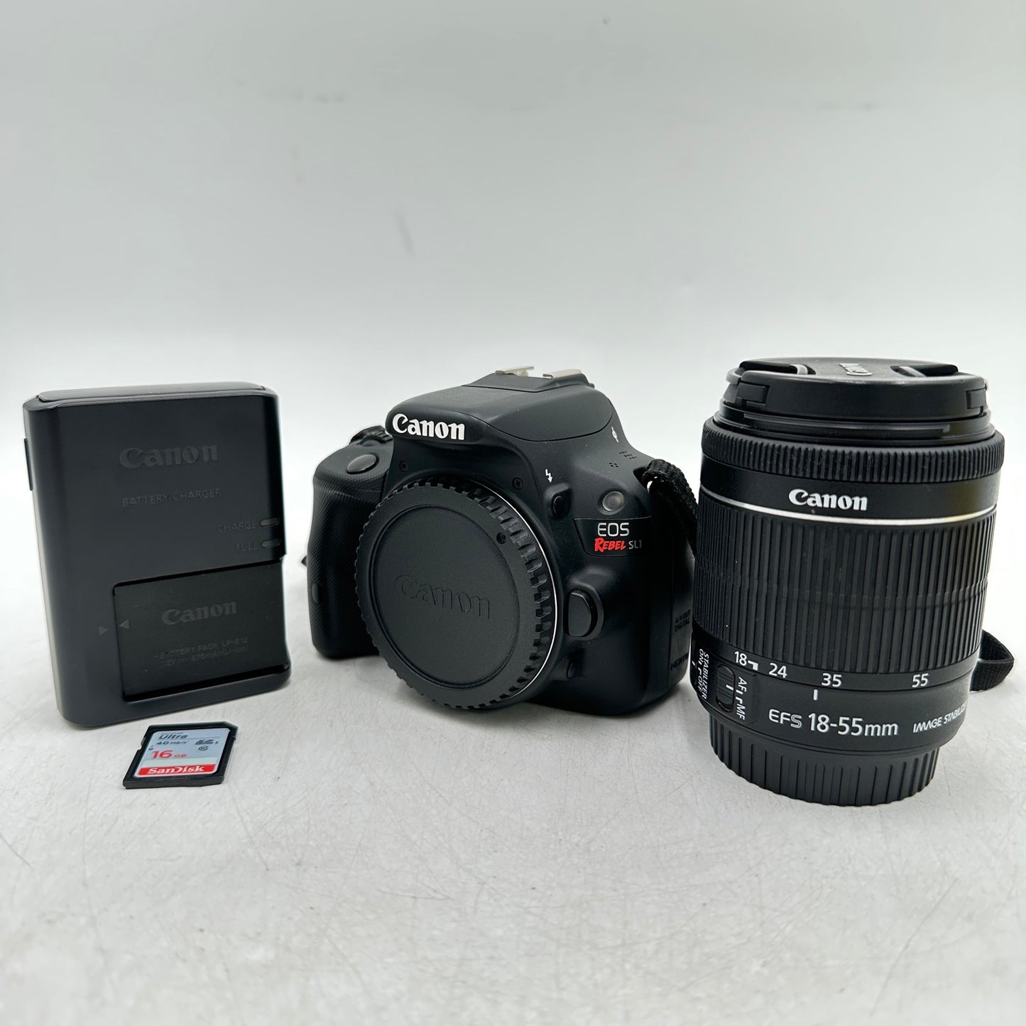 Canon EOS Rebel SL1 18.0MP Digital SLR Camera 5775 SC W/ EFS 18-55mm Lens Kit