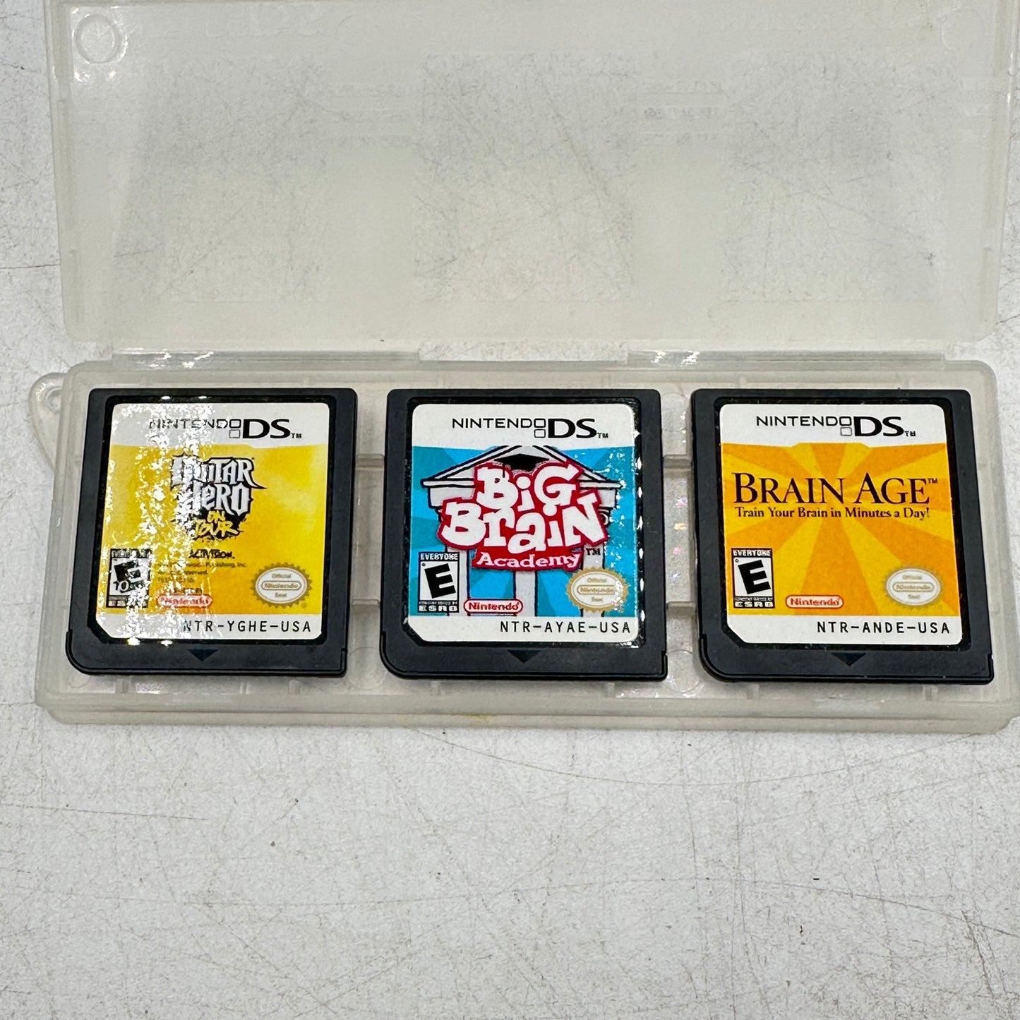 Lot of 3 Nintendo DS Games: Big Brain Academy/Brain Age/Guitar Hero Cartridge Only