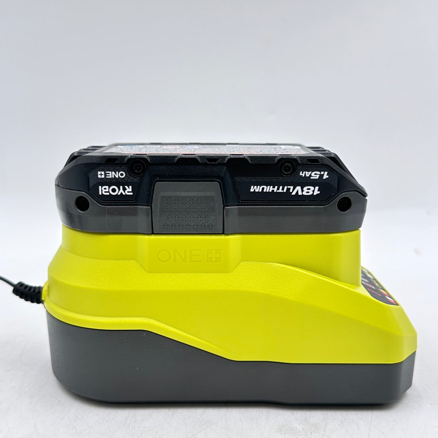 Ryobi One+ PC6002 120V Class 2 Battery Charger + PBP002 18V Li-Ion Battery