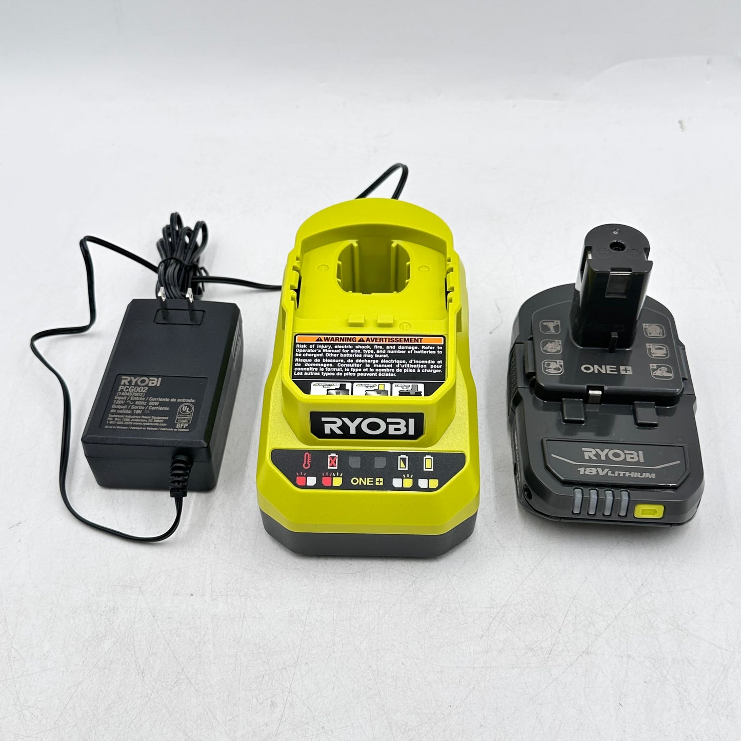 Ryobi One+ PC6002 120V Class 2 Battery Charger + PBP002 18V Li-Ion Battery