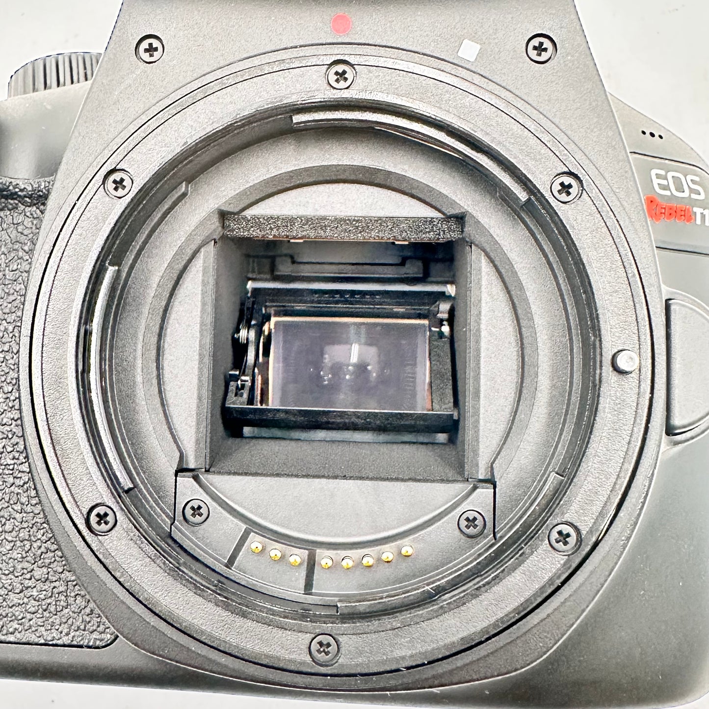 Canon EOS Rebel T100 18.0MP Digital SLR 138 SC + 18-55mm Lens